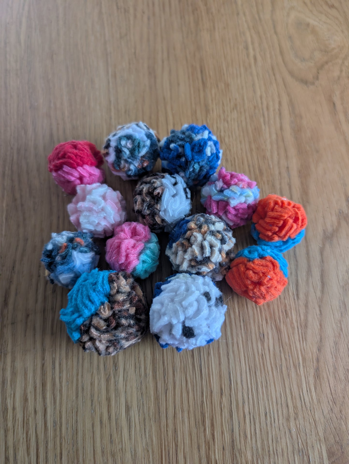 Cat pompoms